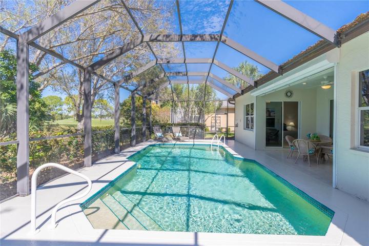 Caged pool deck view from south entrance door
