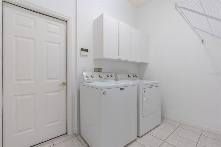 Laundry room with garage door entry