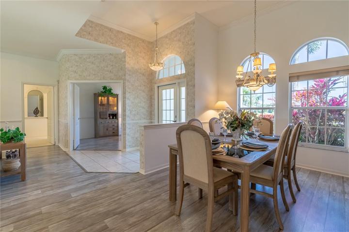 View from Hallway into Dining room and Den