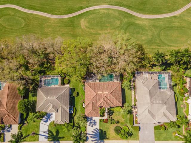 Aerial view of home and golf course