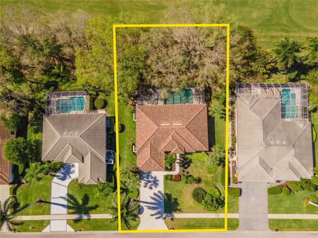 Aerial view of home with llot lines and pool