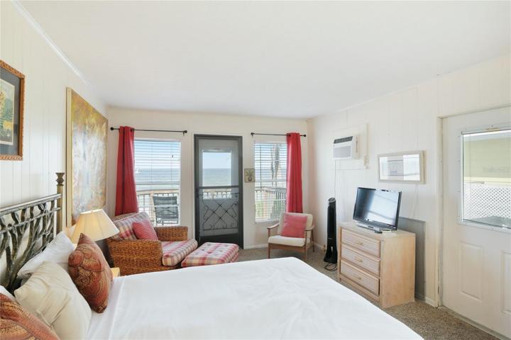 Upstairs guest suite with it's own kitchen, bath and balcony.