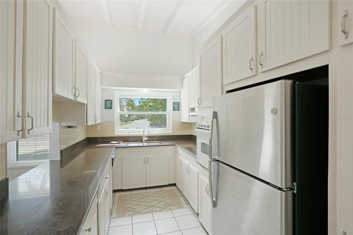 Bright kitchen with plenty of countertop space.