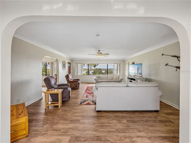 Living room entrance from the hallway.  Lake Wailes can be seen out the picture window.