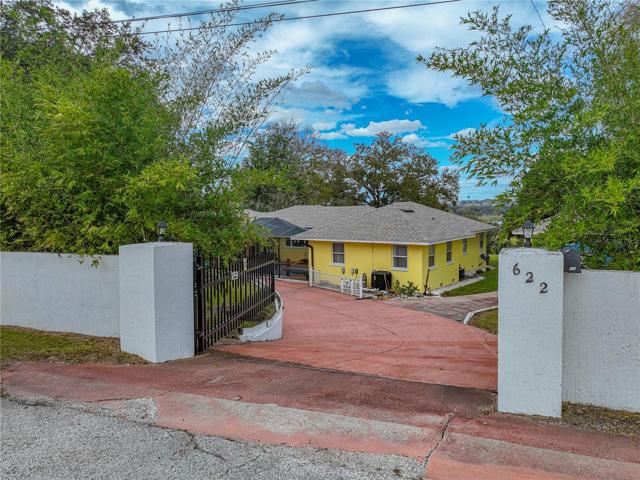 Rear entrance into the driveway of the home.