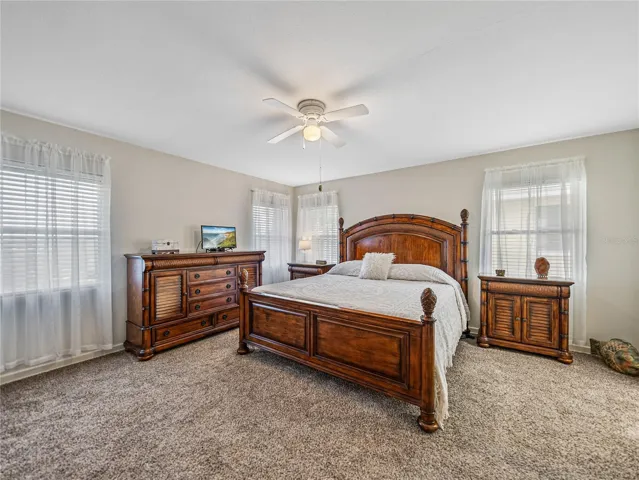 This is the second master suite.  Beautiful lake views can be seen from the front windows in this room.