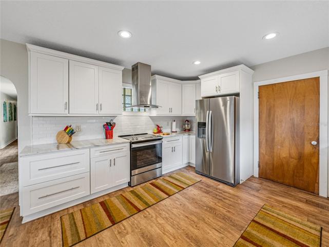 Another view of the kitchen---door to the right leads into the laundry room and half bath.