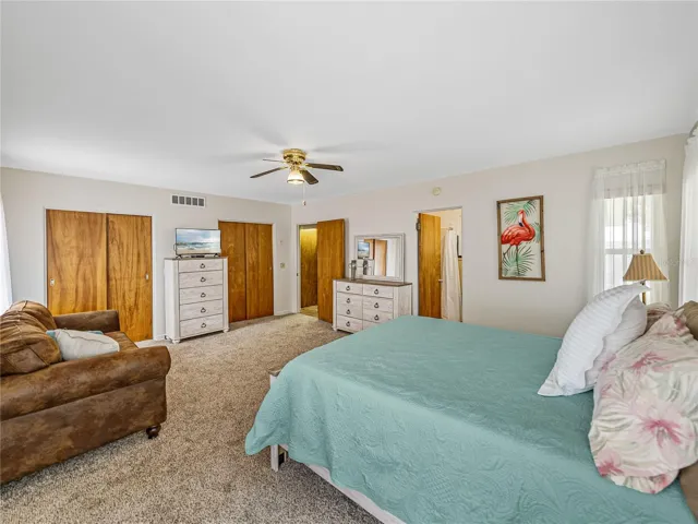 One of the two master suites....double closets and lots of natural light in this room.