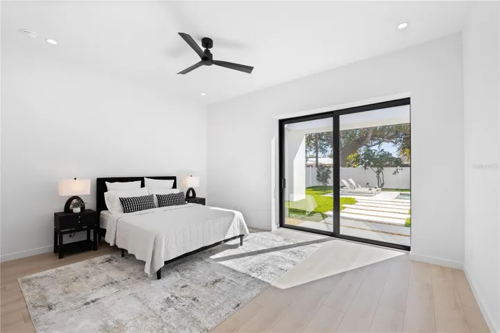 Guest bedroom #3 enjoys views of the pool and back yard