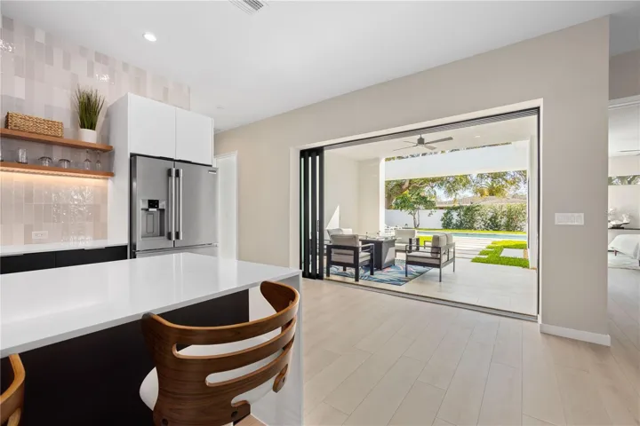 Pocketing sliding glass doors to patio/pool