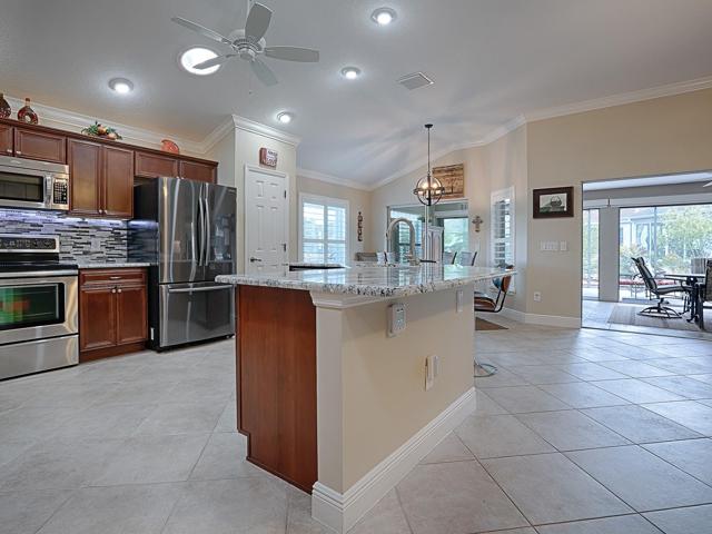 LOVELY ISLAND DESIGN KITCHEN WITH BREAKFAST BAR.
