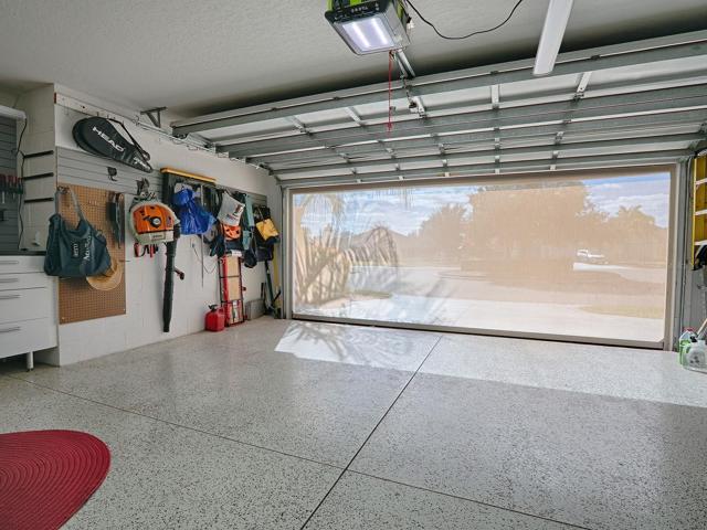 INSULATED GARAGE DOORS AND REMOTE SCREEN DOOR. FULL HOUSE FILTRATION SYSTEM TOO.