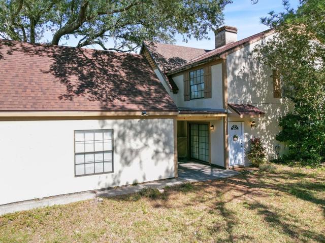 Side entry to front door and garage