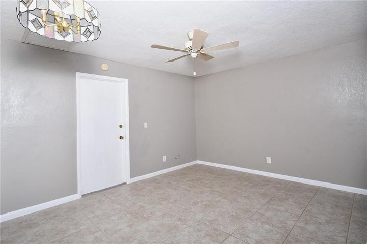 From “dining” and “den” area to the garage.