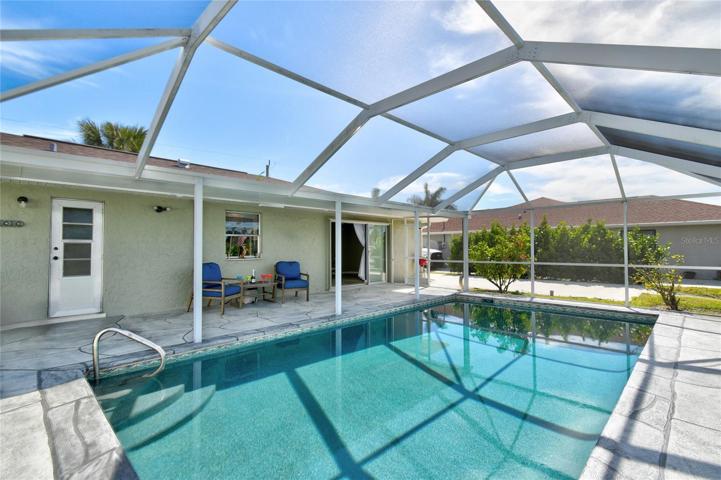 Spacious deck surrounding the pool