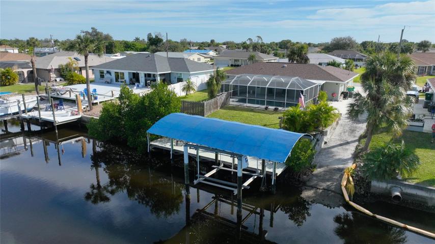 Dock, boat lift with canopy.  Extended dock is 7’ x 37.’