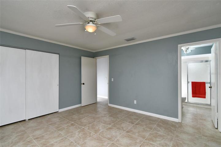 Primary bedroom looking at master bath