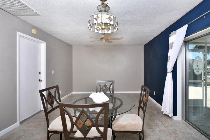 Dining area and room for a den/office/flex area.