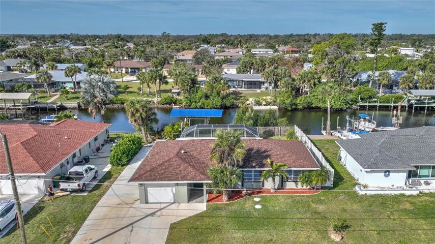 Beautifully maintained home with extra driveway for RV, jet skis, canoe or other vehicles.  Prime waterfront on Meager Waterway.
