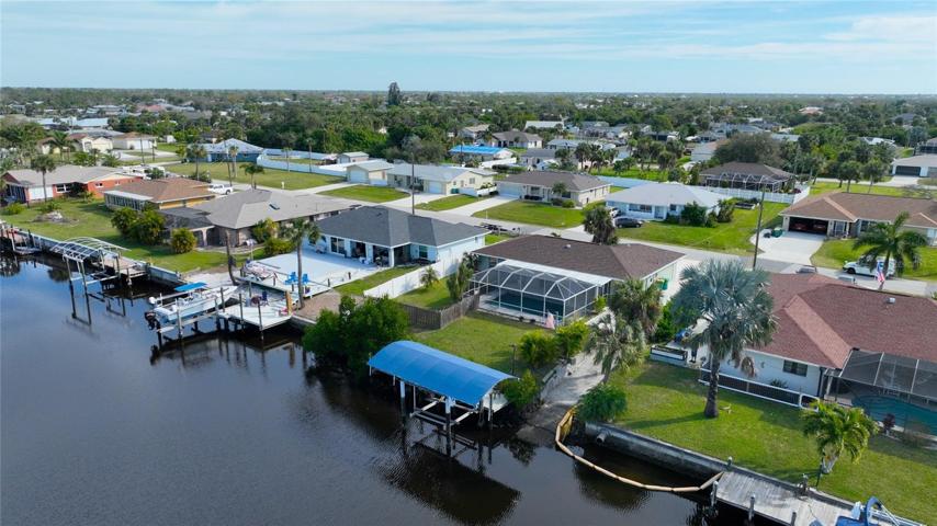View of the back of the house with the canopy over the expanded dock
