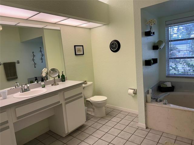 Master bath with a linen closet
