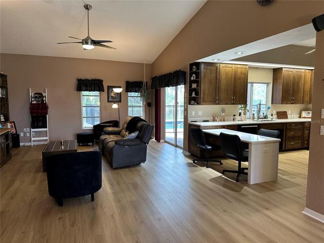Livingroom kitchen & sliders to lanai