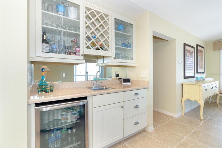 Living Area and Bar Fridge.