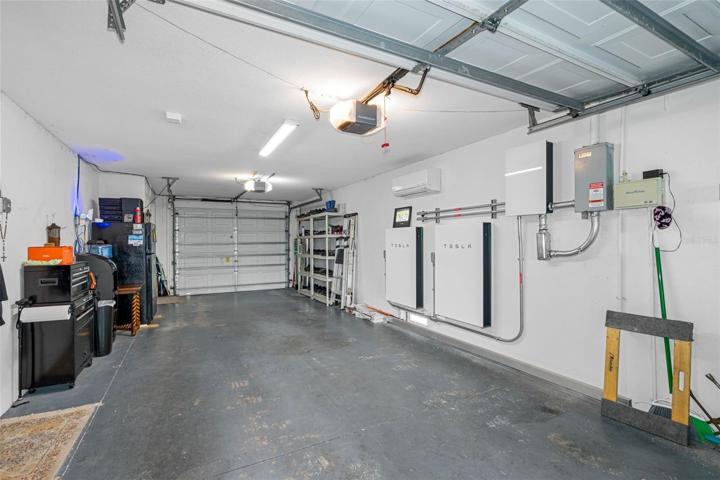 4 car garage includes Telsa Power Wall and Lifesource Water Purification,  salt free- maint free