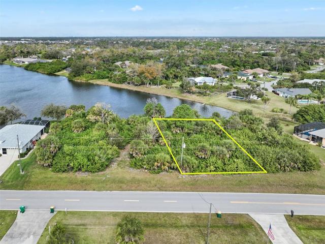 Approimate Yellow Lines. There are 4 vacant Lots in the Picture, all of which are apporimately 65' wide. The listing is 2nd vacant lot from the right.