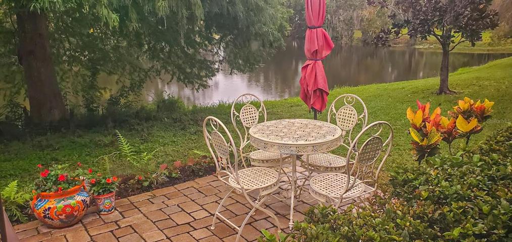 Lovely patio overlooking pond.