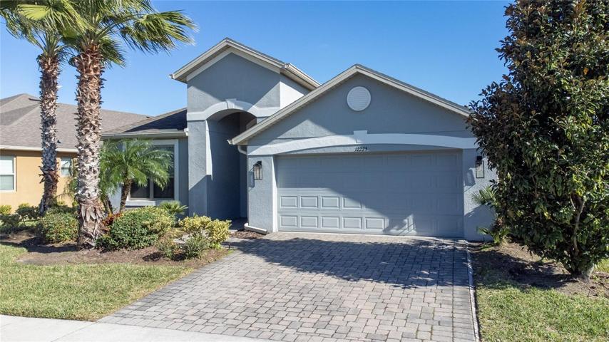 12225 Sandy Apple  Front view. Driveway fits 2 cars.