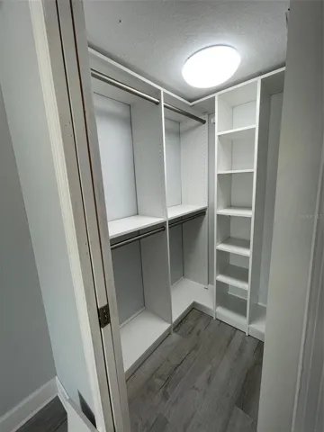 New primary closet with custom built-ins.