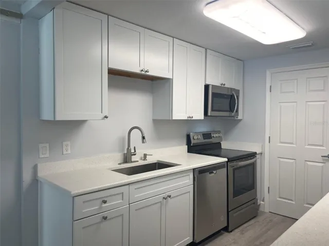 Kitchen with stainless appliances.