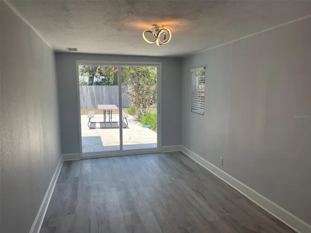 Primary bedroom with access to pool.