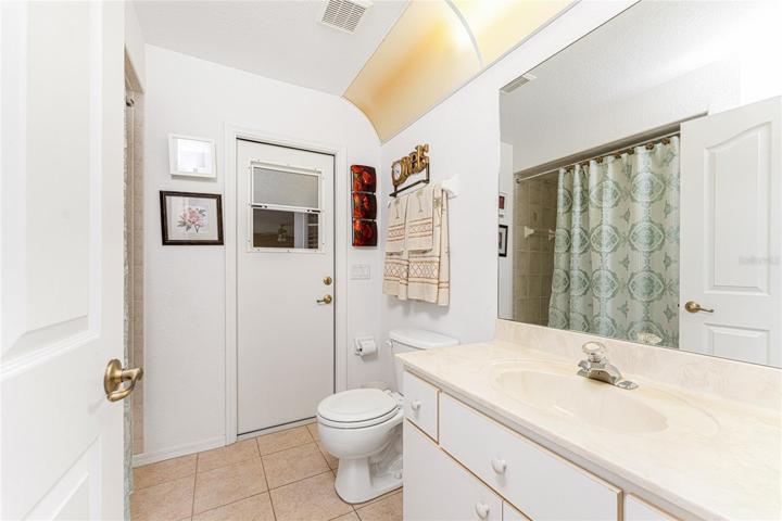 Bath 2 with door to lanai