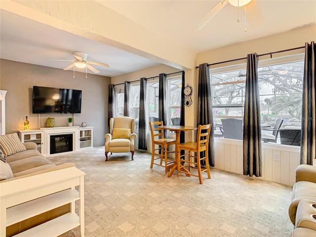 This home boasts an amazing family room that offers a relaxing view of your backyard oasis