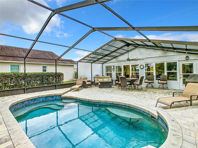 Screened lanai is 27' x 31' with paver flooring.