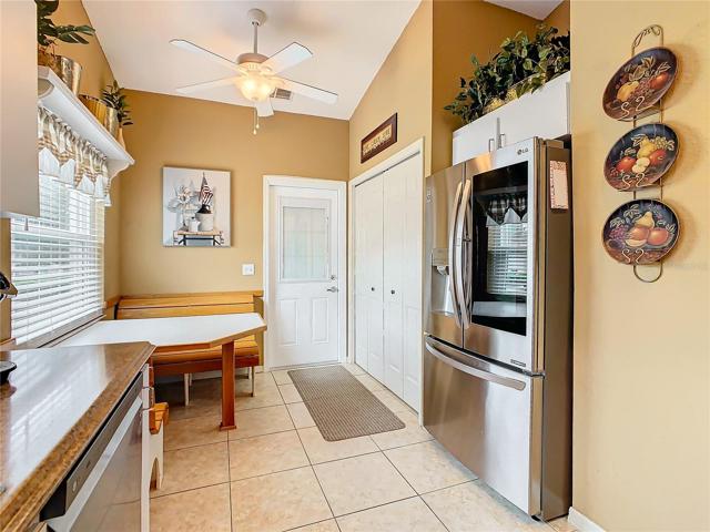 Built in dinette set and the washer and dryer are in the closet at the back right side of picture.
