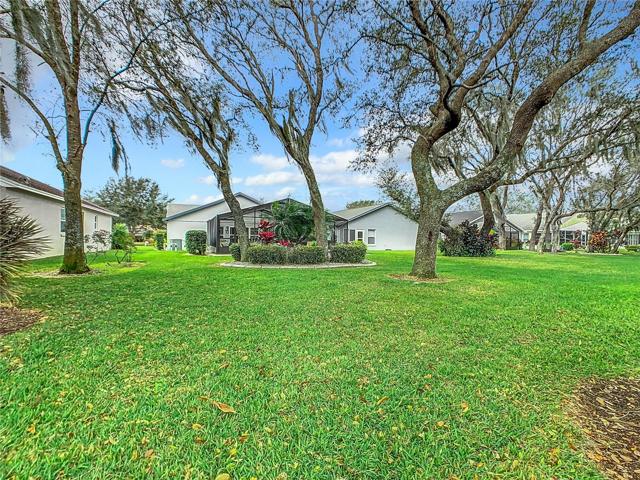 View looking from the back yard to the back of the home.