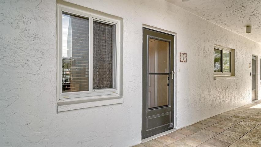 Unit #111. 8911 Midnight Pass Road. 2nd Building.