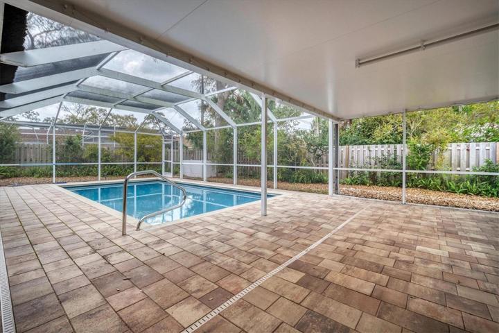 Screened Lanai with pool and Seating Area
