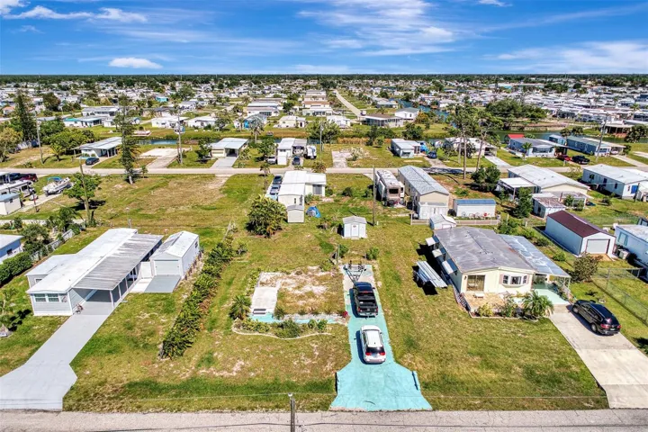 LOOKING FOR A LOT TO PUT A NEW MANUFACUTRED HOME ON?  THIS LOT HAS WATER, SEWER, ELECTRICAL AND NOTE THE DRIVE WAY (GREEN).