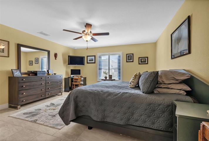 Master bedroom spacious with walk in closet.