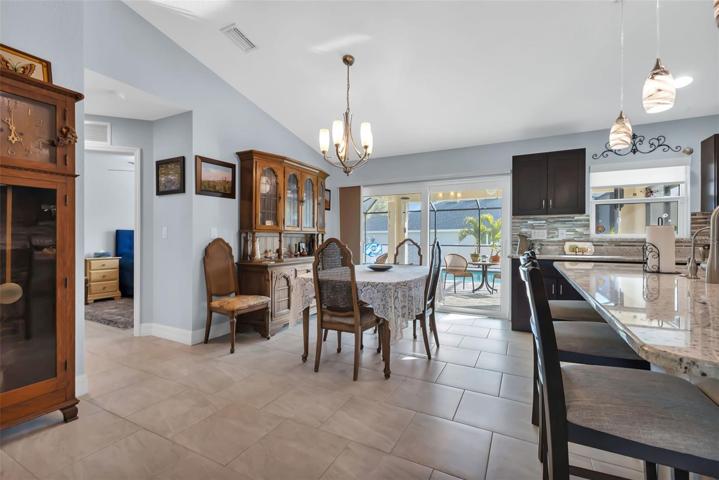 Open floor plan dining room off of kitchen