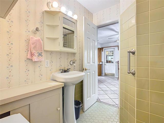 Bathroom #3 is downstairs and can be used as an en-suite bath and guest bathroom.