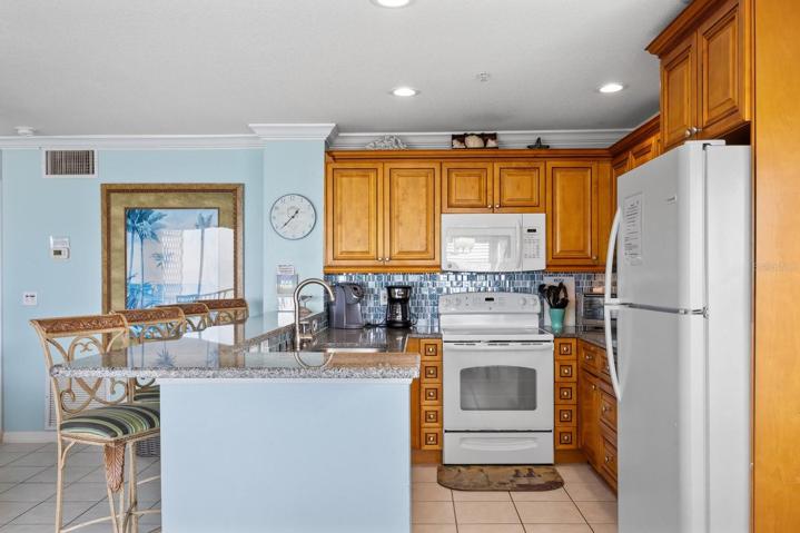Kitchen with Granite Counters / Breakfast Bar