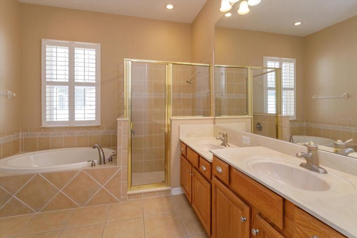 Master en-suite with double vanity, soaking tub and large shower.