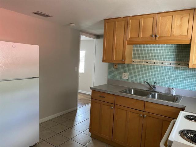 KITCHEN W/CERAMIC TILE FLOORING