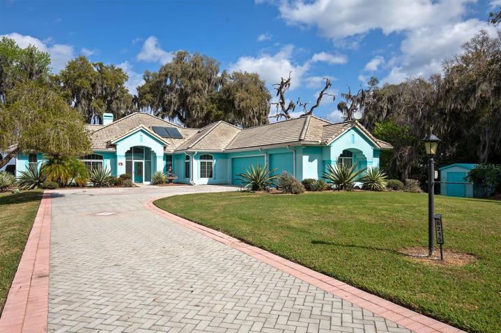Front with long driveway