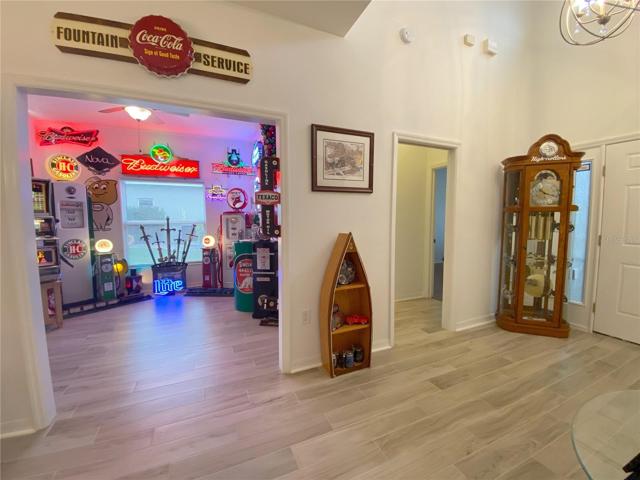 Entrance with Tile Plank Flooring. Den Office